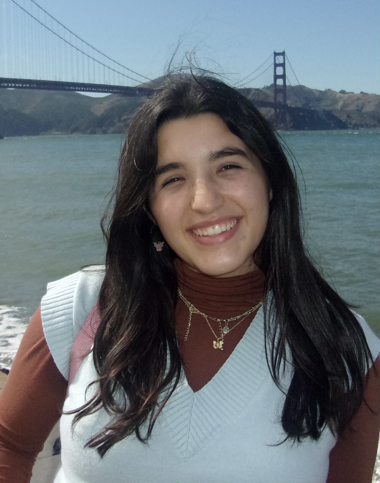 image of me smiling in front of the Golden Gate Bridge